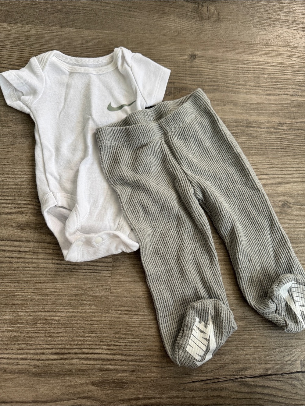 Nike Baby White Bodysuit with Gray Ribbed Footed Pants